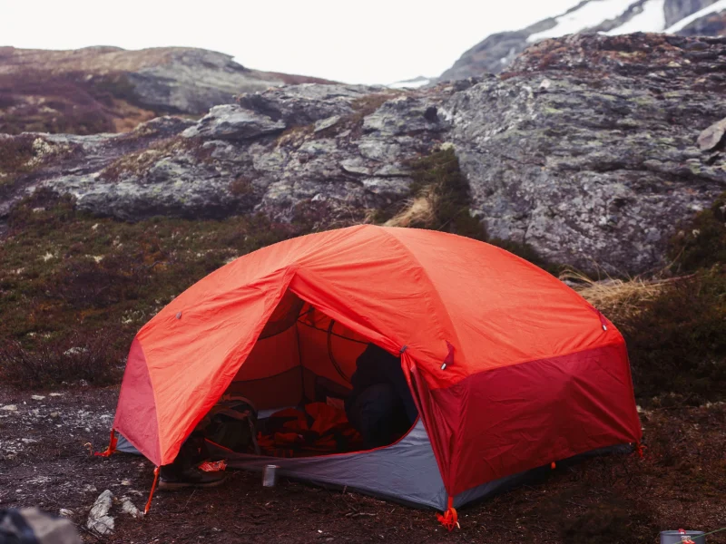 red-tent-stands-ground-somewhere-mountains